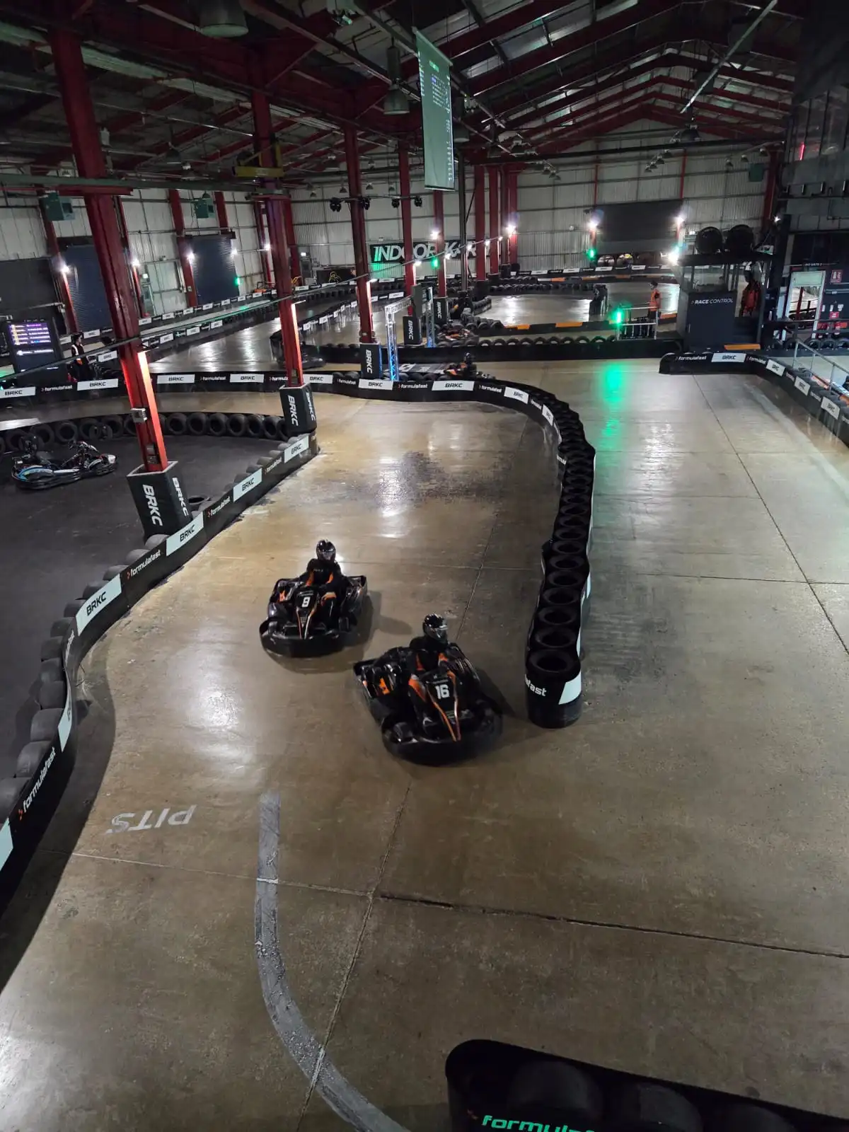 Karting battle on an indoor circuit